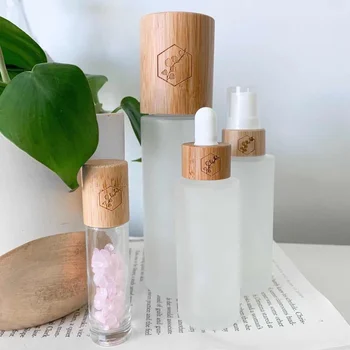 Индивидуален проба лого с надпис 30 мл 120 мл 100 мл Биоразградими дървени бутилки за крема Натурална луксозна бамбук козметична опаковка